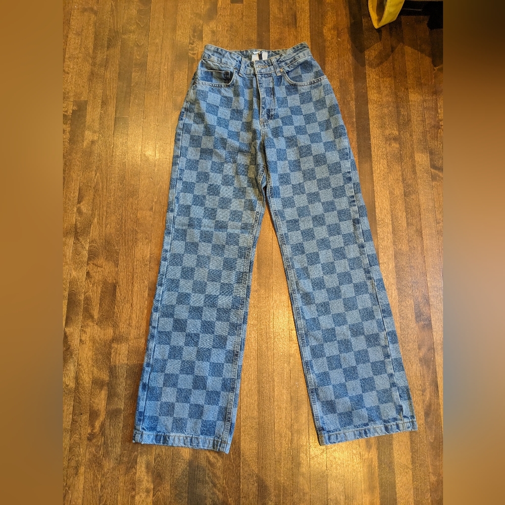 The ragged priest checkered jeans